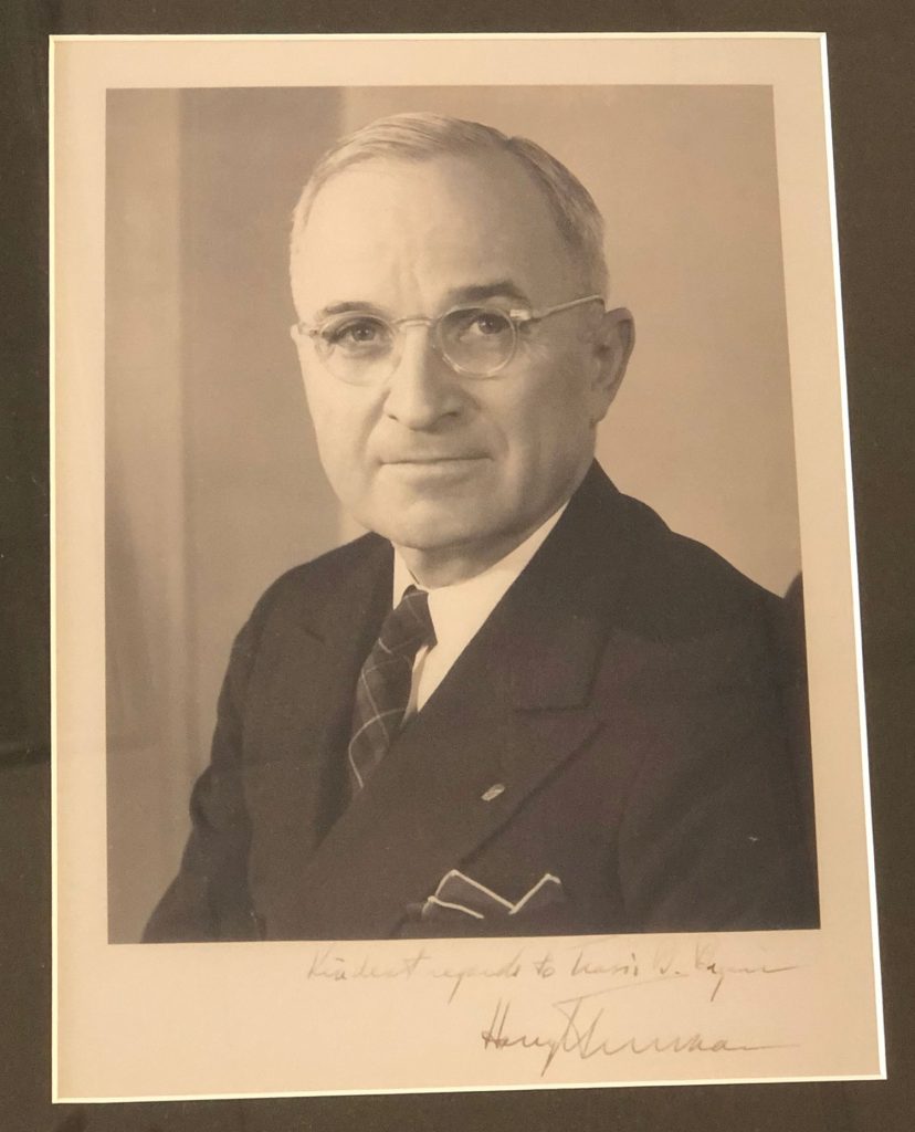 signed photo of President Harry S. Truman given to Travis B. Bryan. Message reads, "Kindest regards to Travis B. Bryan, Harry Truman"